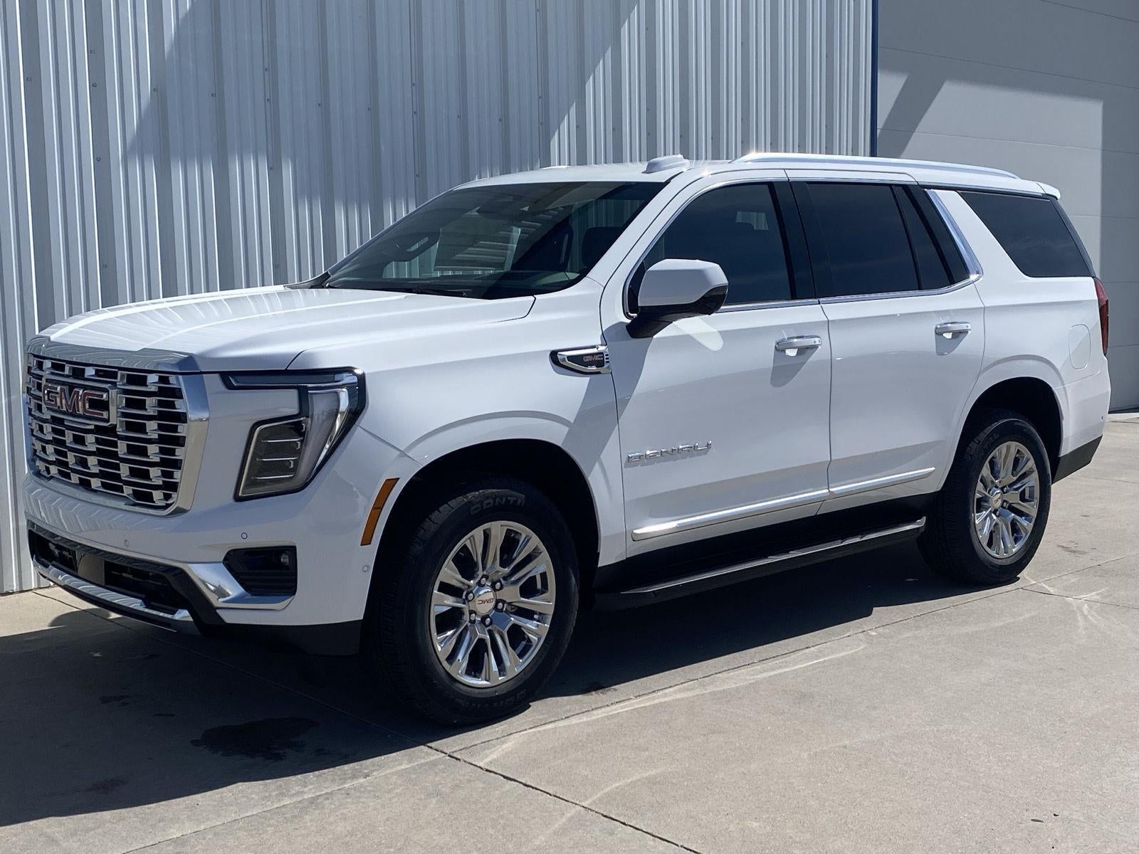 2026 GMC Yukon Denali in Summit White — front three-quarter view