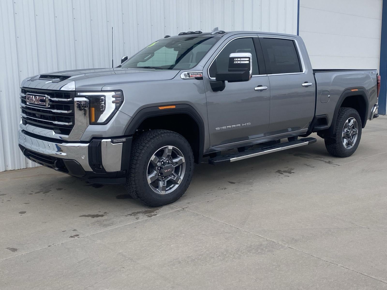 2026 GMC Sierra 2500 HD SLT in Sterling Metallic — front three-quarter view