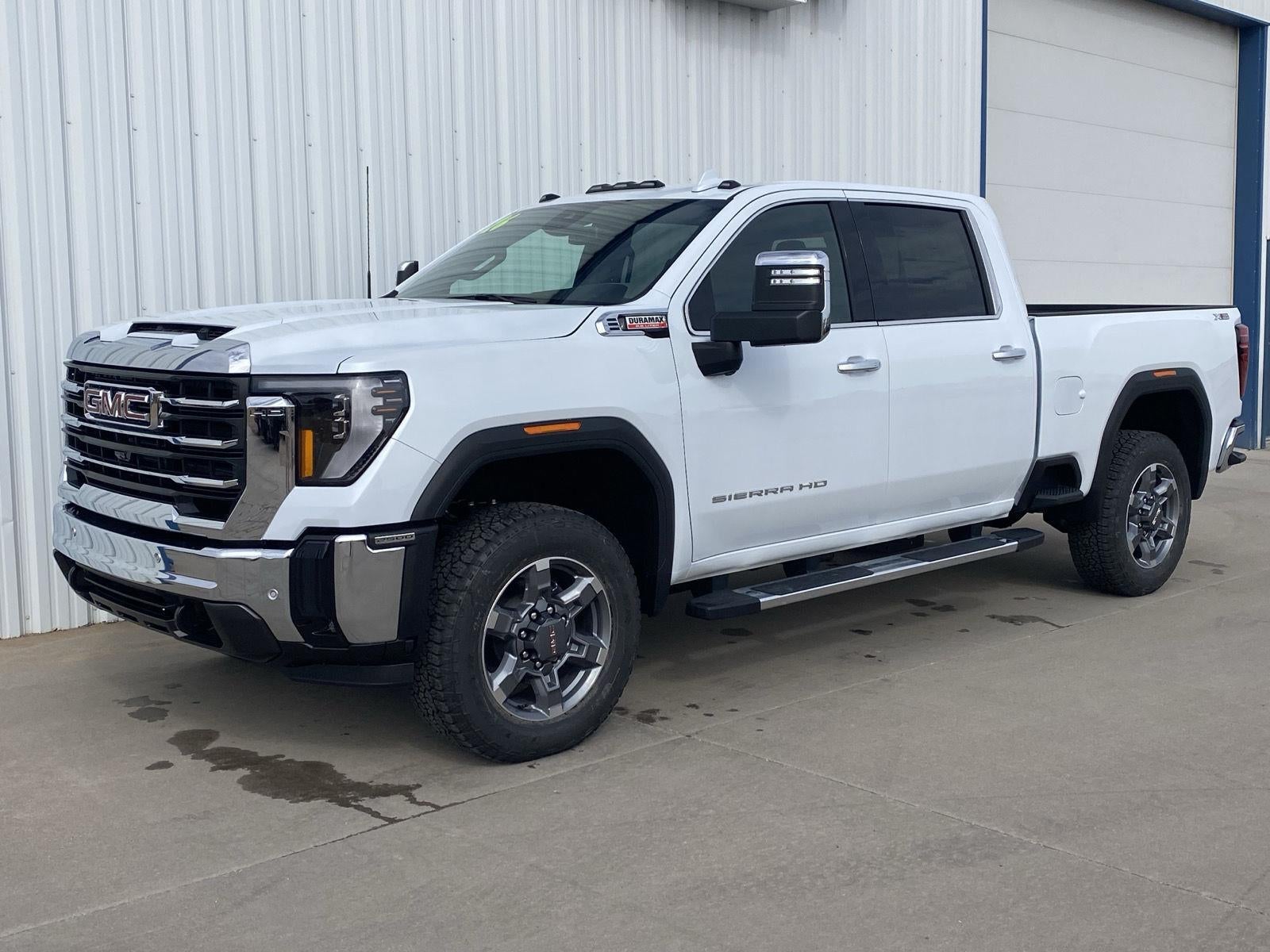 2026 GMC Sierra 2500 HD SLT in Glacier White Tricoat — front three-quarter view
