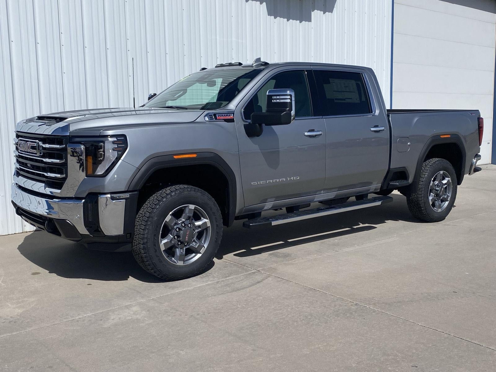 2026 GMC Sierra 2500 HD SLT in Sterling Metallic — front three-quarter view