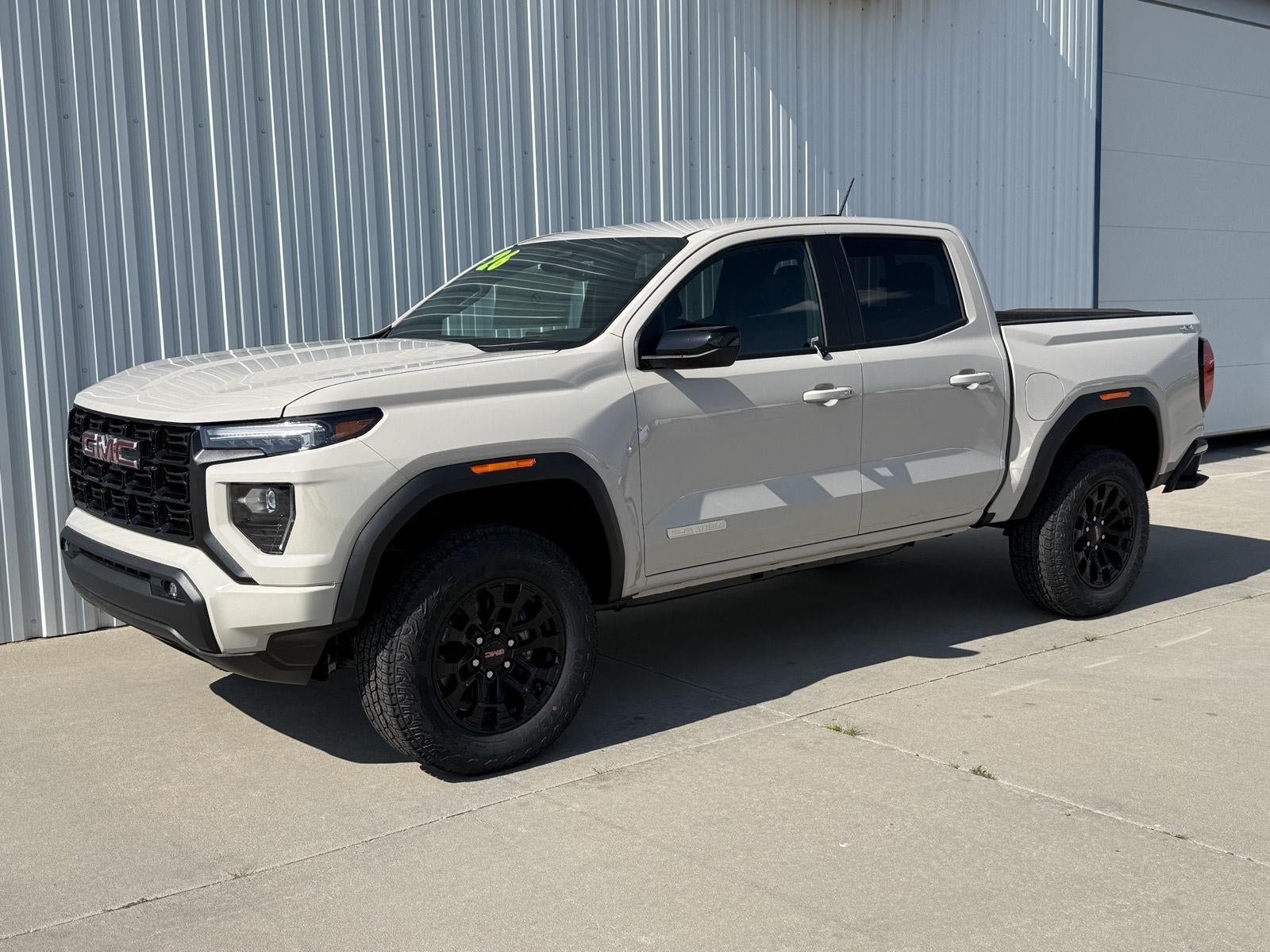 2026 GMC Canyon Elevation in Coastal Dune — front three-quarter view