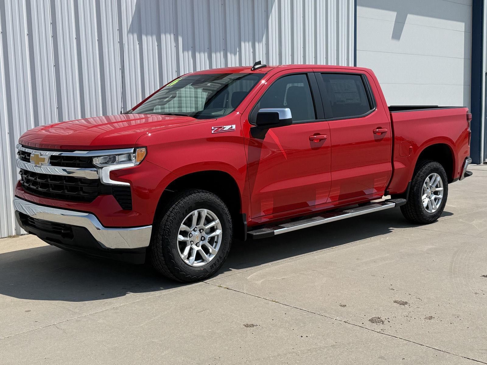 2026 Chevrolet Silverado 1500 LT in Red Hot — front three-quarter view