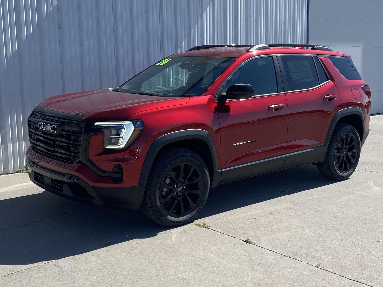 2026 GMC Terrain Elevation in Volcanic Red Tintcoat — front three-quarter view