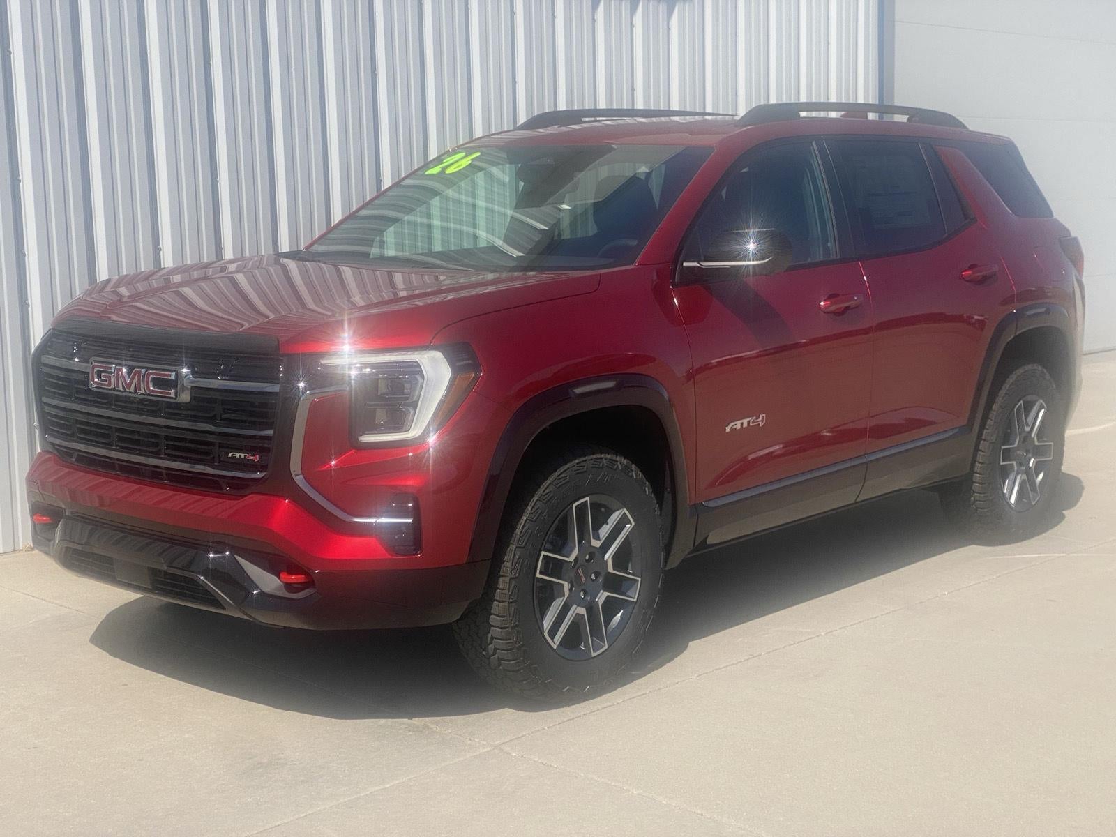 2026 GMC Terrain AT4 in Volcanic Red Tintcoat — front three-quarter view
