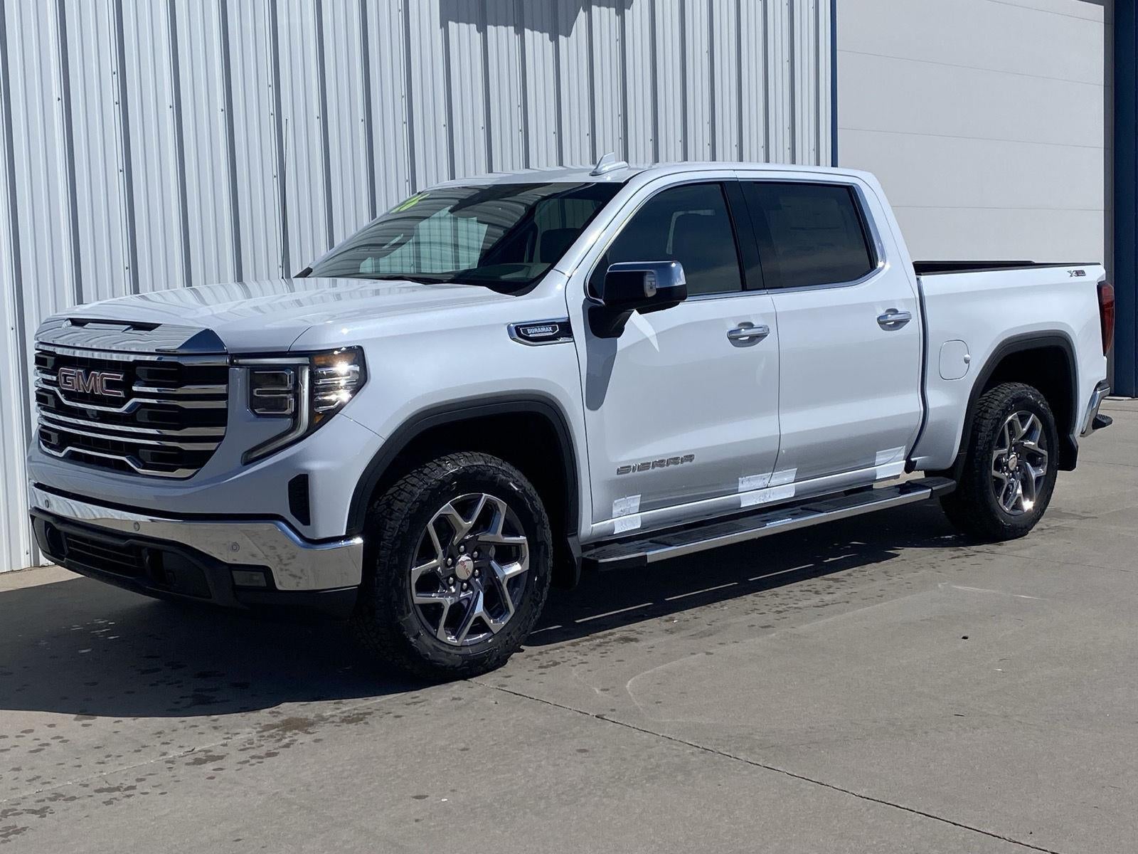 2026 GMC Sierra 1500 SLT in Glacier White Tricoat — front three-quarter view