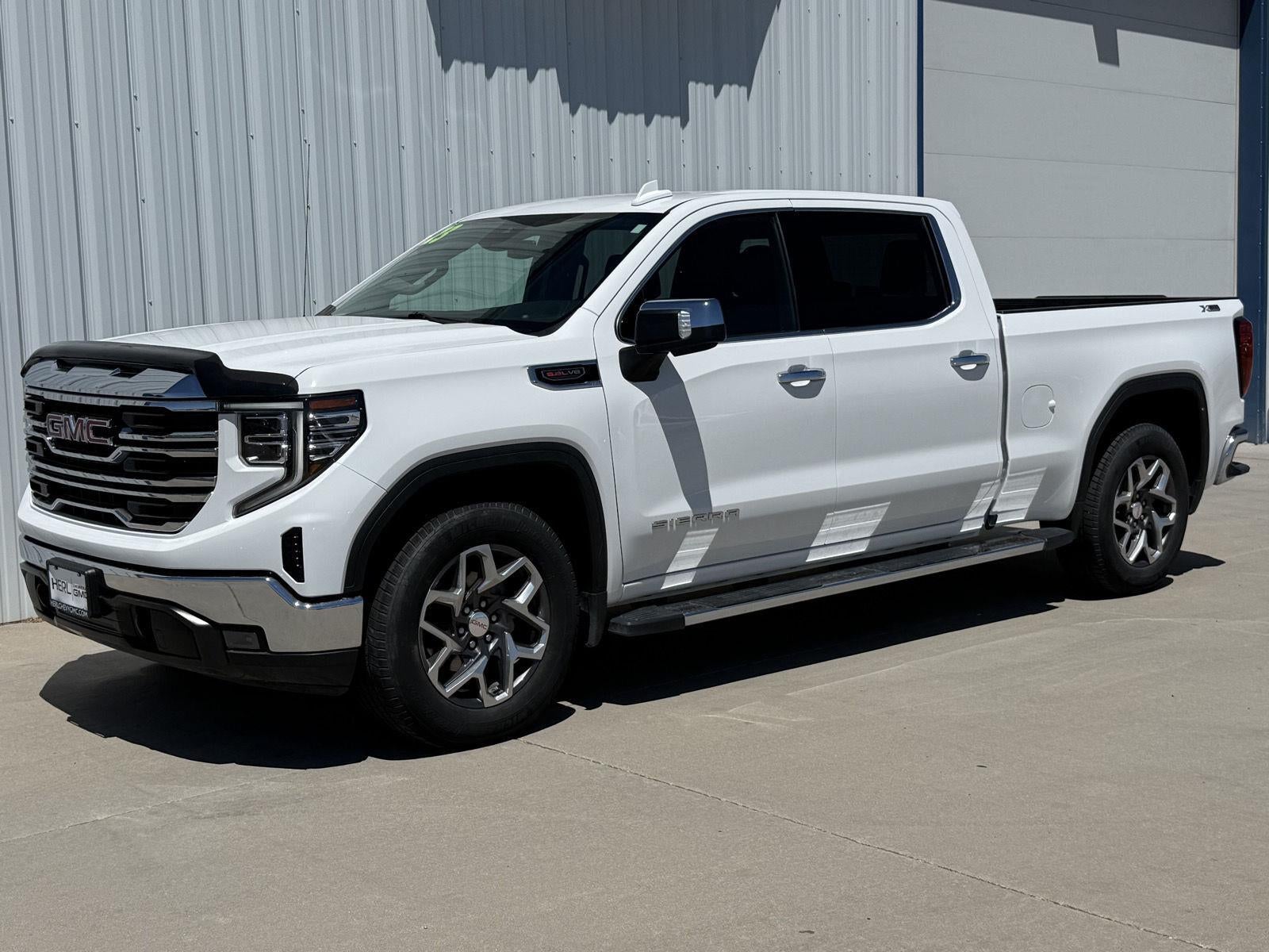 2023 GMC Sierra 1500 SLT in Summit White — front three-quarter view